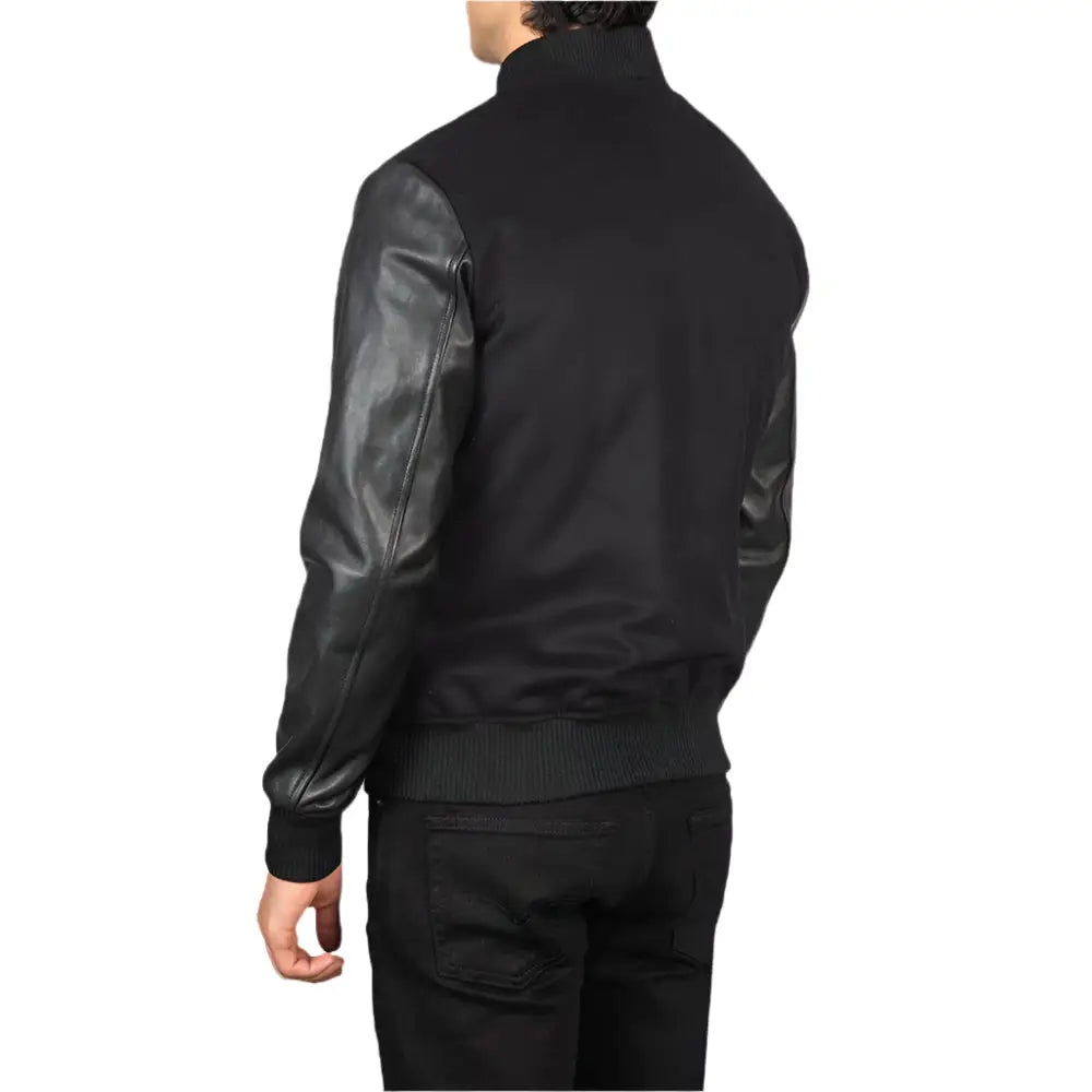 Men_Vaxton_Black_Hybrid_Varsity_Jacket_Tilted_Back